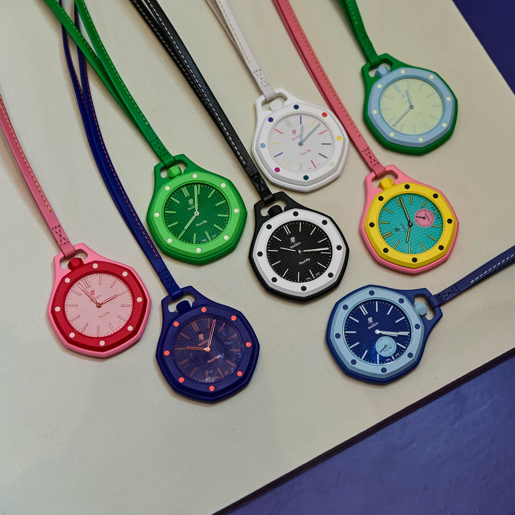 All eight Royal Pop models displayed with their colorful lanyards